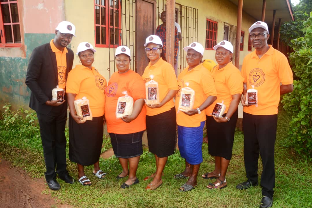 LAOF volunteers standing together on a grassy area