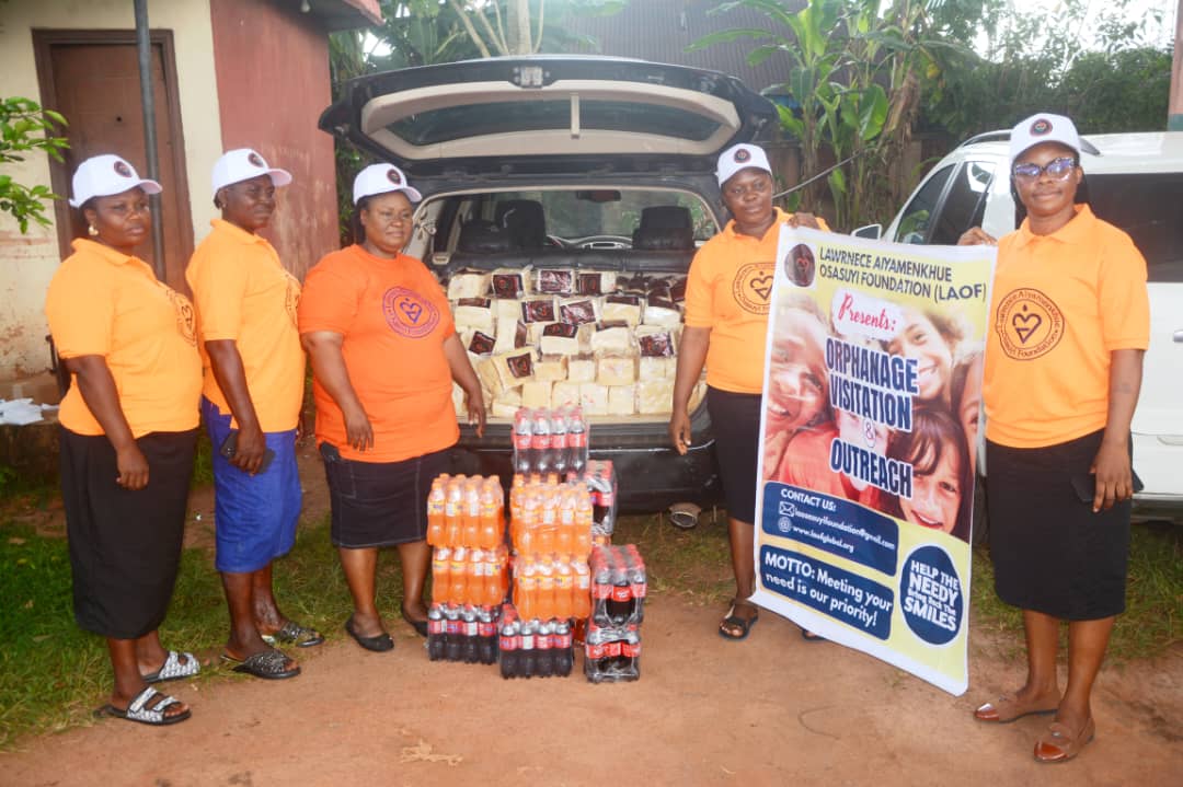 LAOF volunteers with outreach supplies outside a community venue
