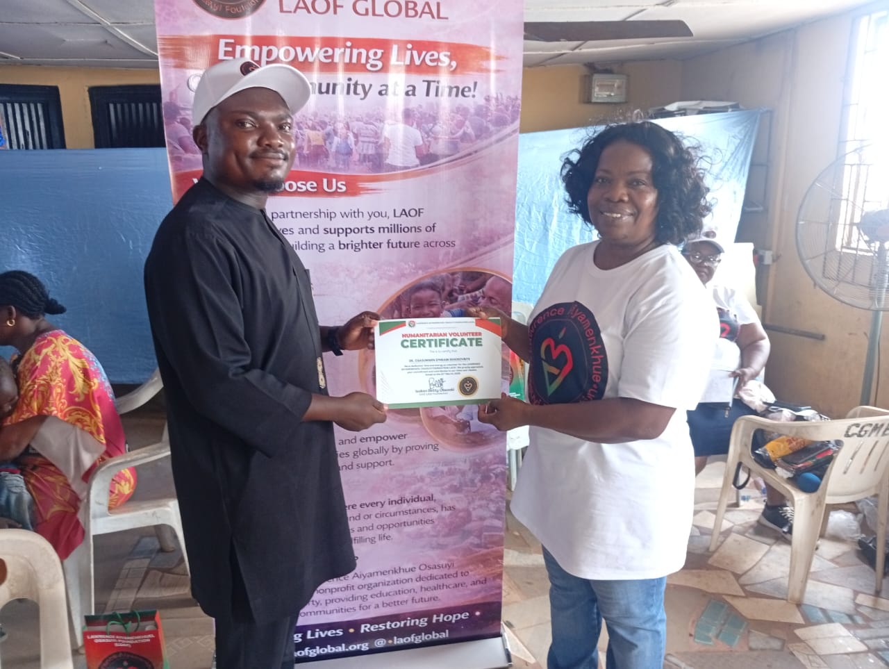 LAOF team member presenting a document to an outreach participant
