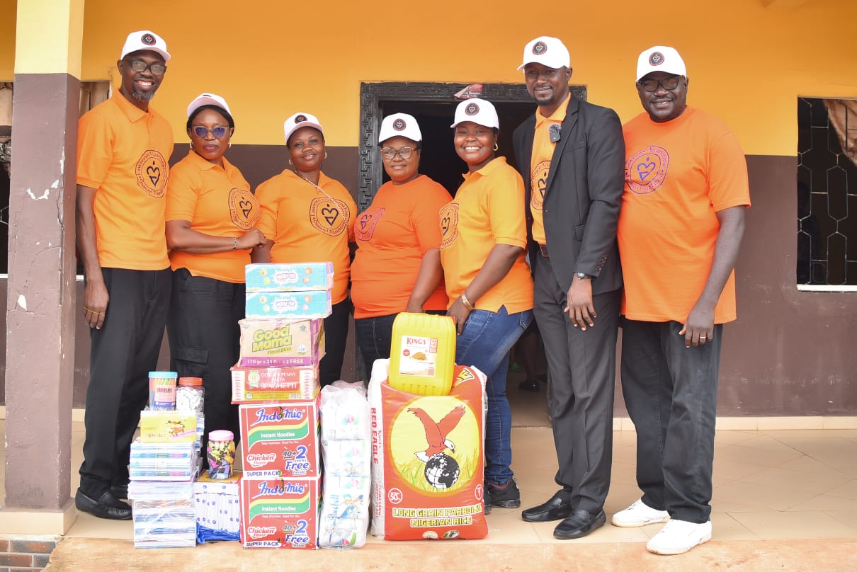 LAOF team with boxes of donated supplies at a community visit