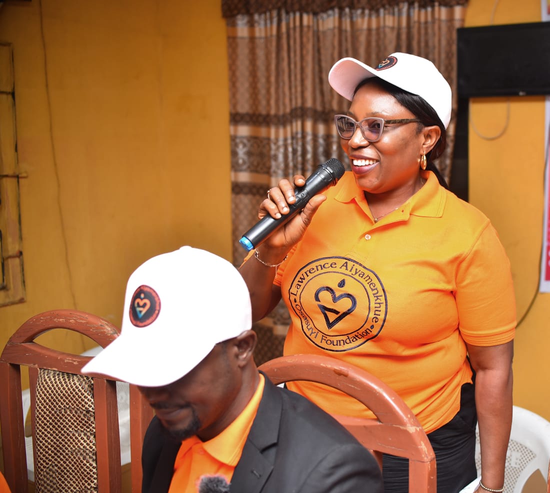 LAOF volunteer speaking at a community visit