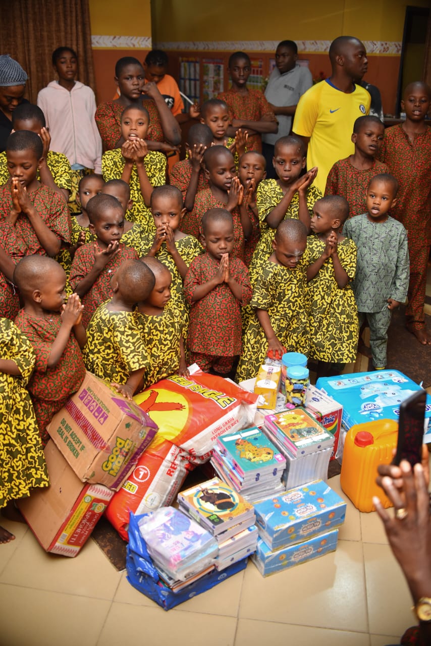 Children gathered together during a LAOF community visit